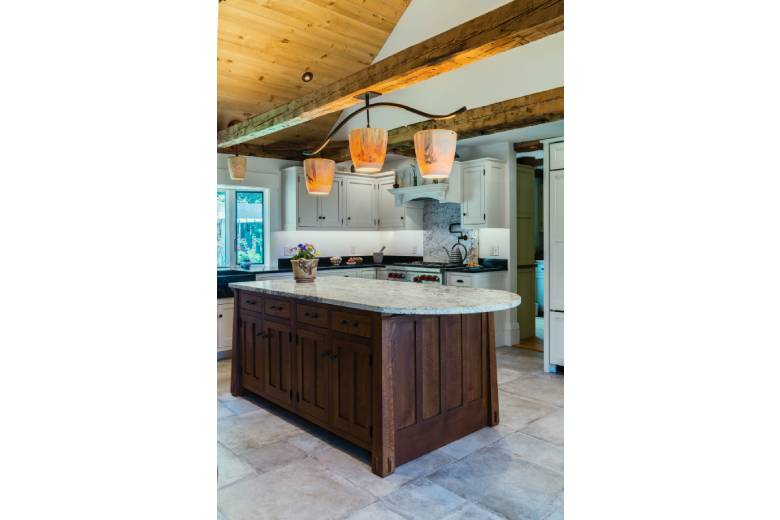 Kitchen Island with Granite Countertops and Wooden Accents