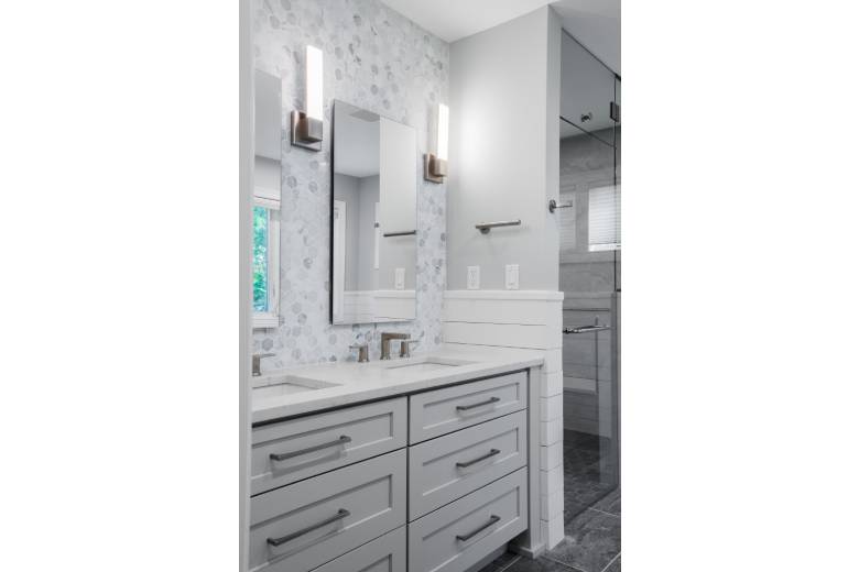 Modern Bathroom Double Sink with White Counters and Gray Drawers