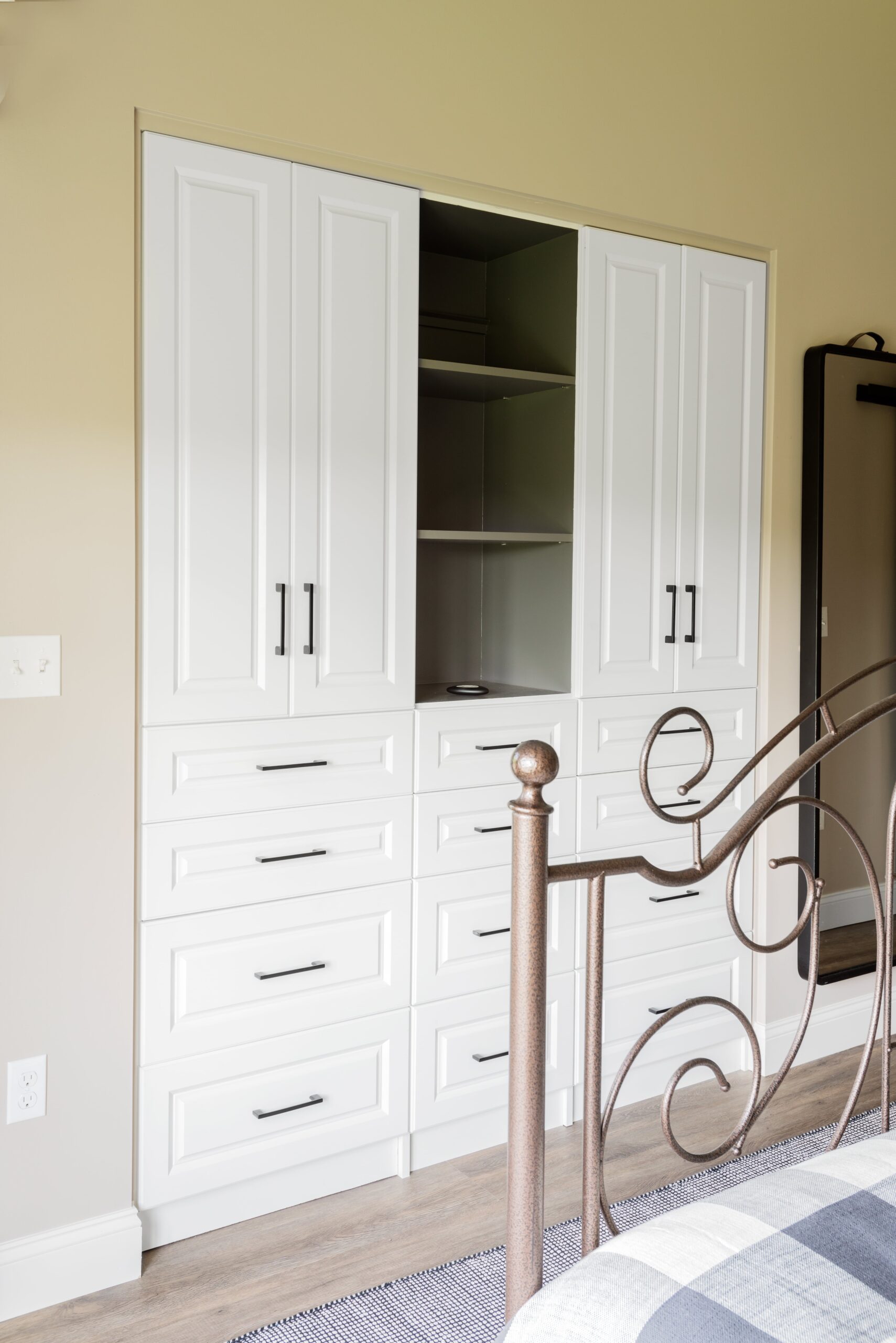 Build in white cabinets with storage